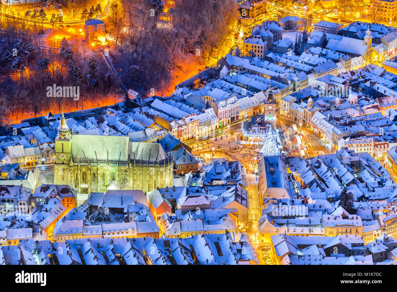 Brasov, Romania. Christmas Market in Main Square, with Xmas Tree and lights Transylvania landmark, Eastern Europe Stock Photo