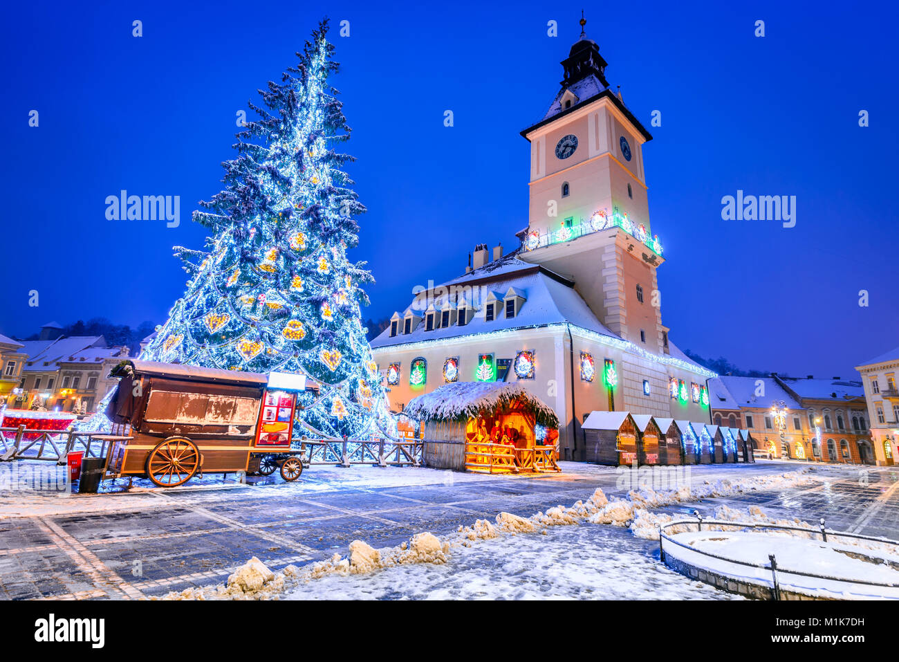 Brasov, Romania. Christmas Market in Main Square, with Xmas Tree and lights Transylvania landmark, Eastern Europe Stock Photo