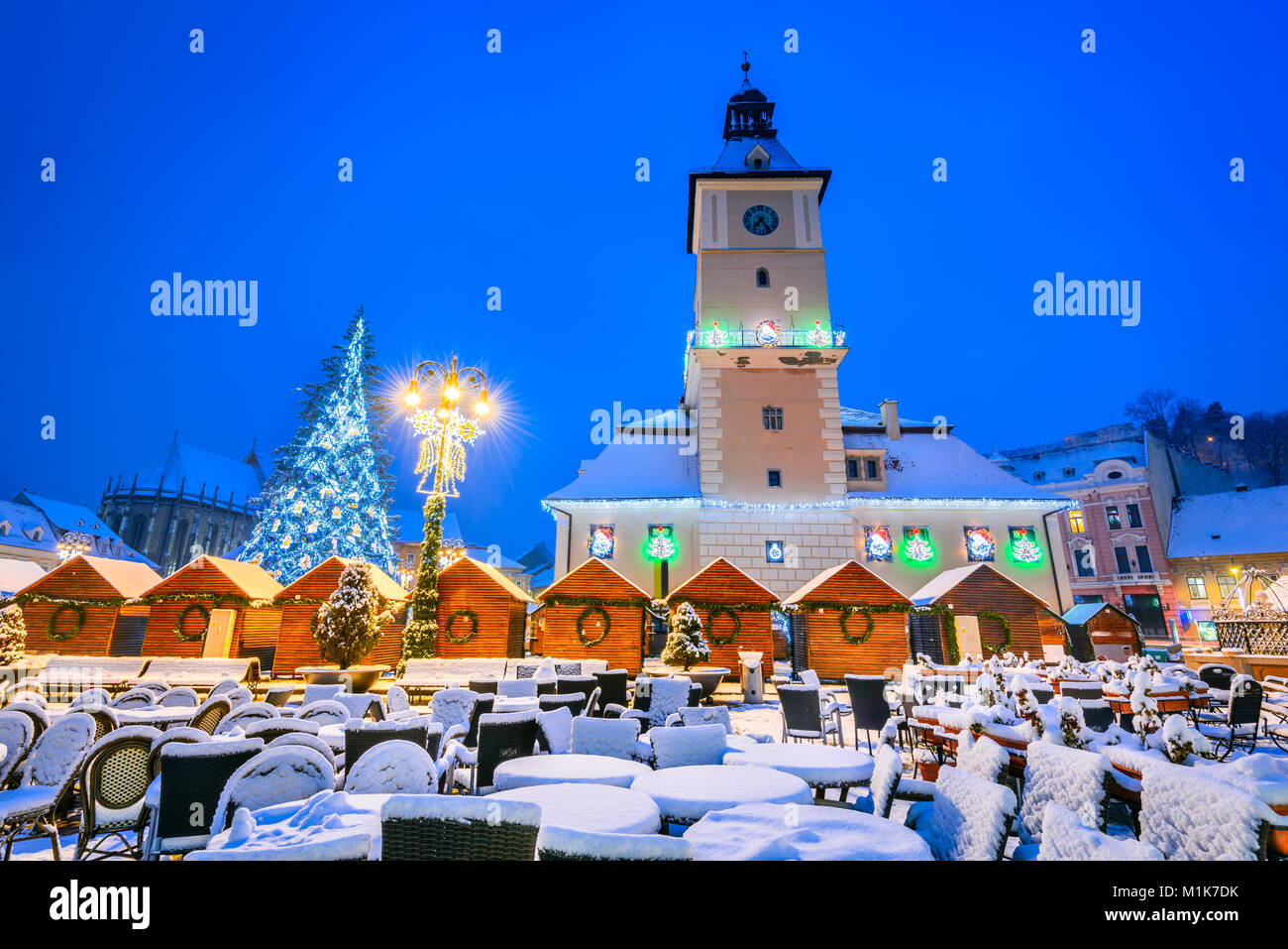 Brasov, Romania. Christmas Market in Main Square, with Xmas Tree and lights Transylvania landmark, Eastern Europe Stock Photo