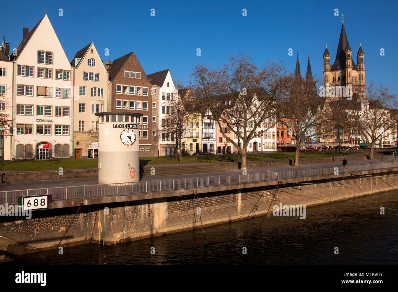 Germany, Cologne, water level clock in the old part of the town at the