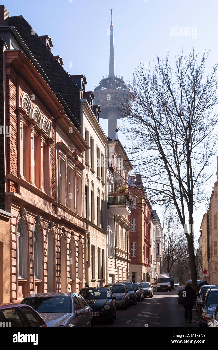 Germany, Cologne, houses at the Christian-Schult street in the district Ehrenfeld, television tower Colonius.  Deutschland, Koeln, Haeuer in der Chris Stock Photo