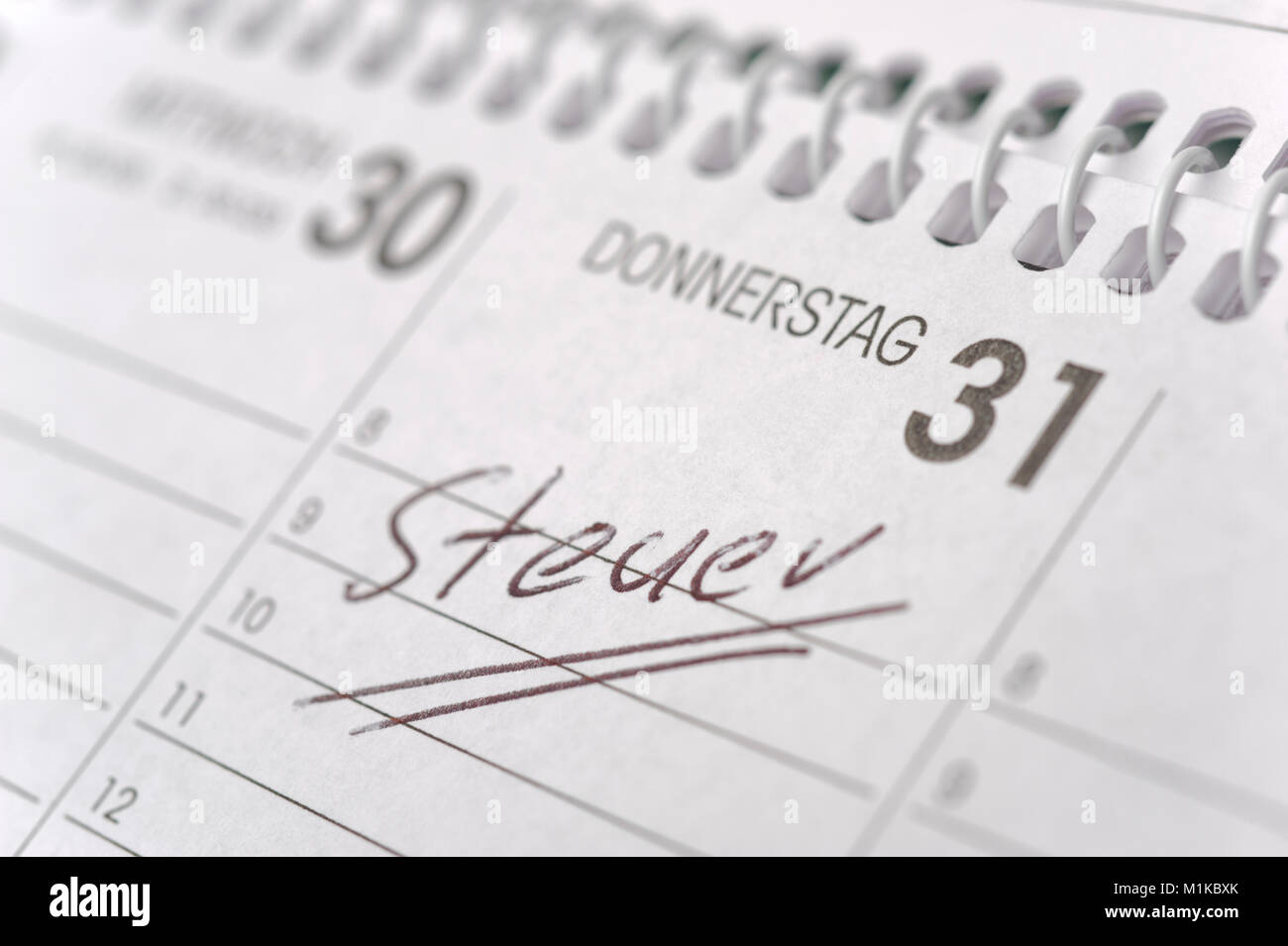 calendar marked with german tax-day Stock Photo