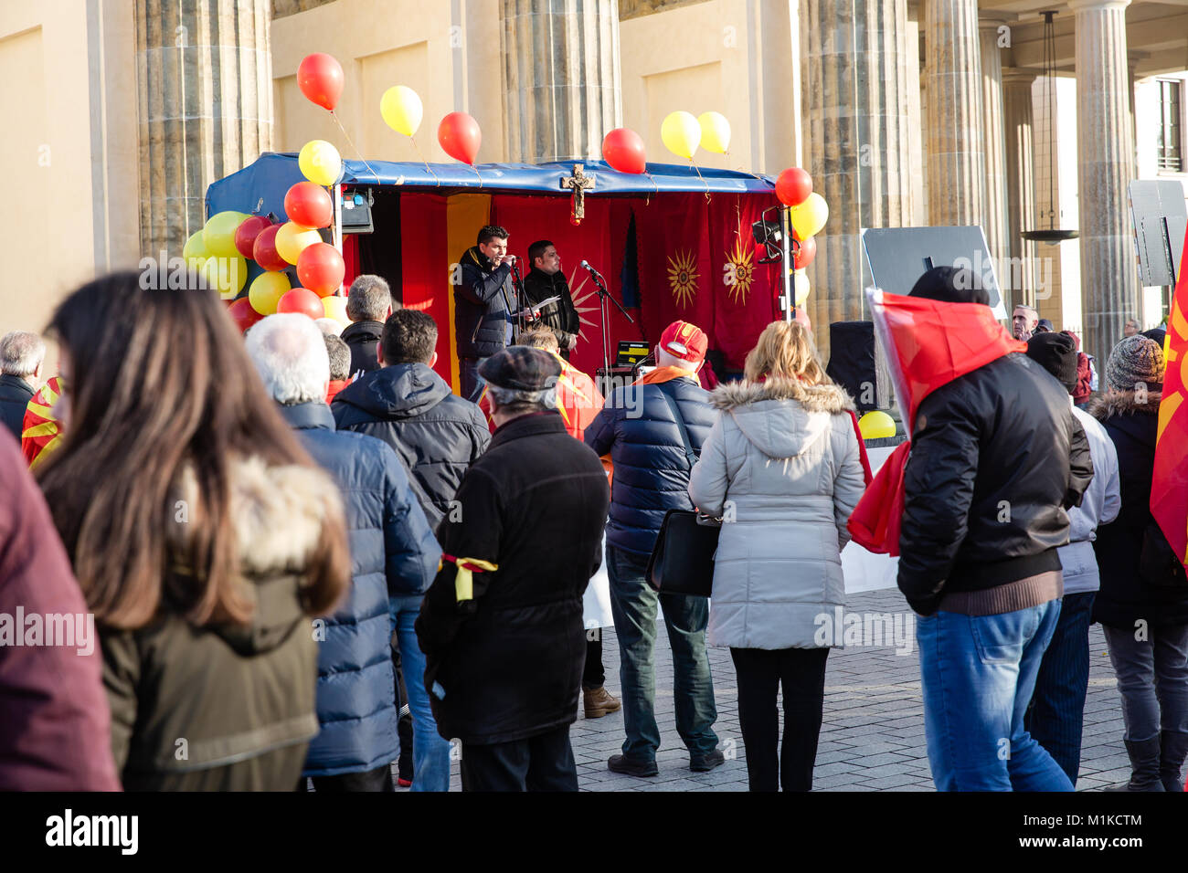 Macedonians living in Berlin staging a peaceful protest to demonstrate disapproval of Macedonian government policies and calling for nation unity Stock Photo