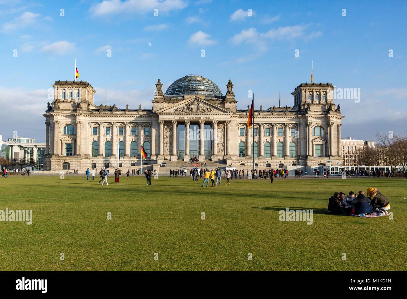 Reichstag historic building in Berlin is the meeting place of the Bundestag, the lower house of Germany’s national legislature. Blue sky Stock Photo