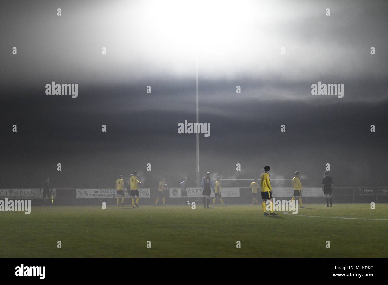 Football in the fog Stock Photo Alamy