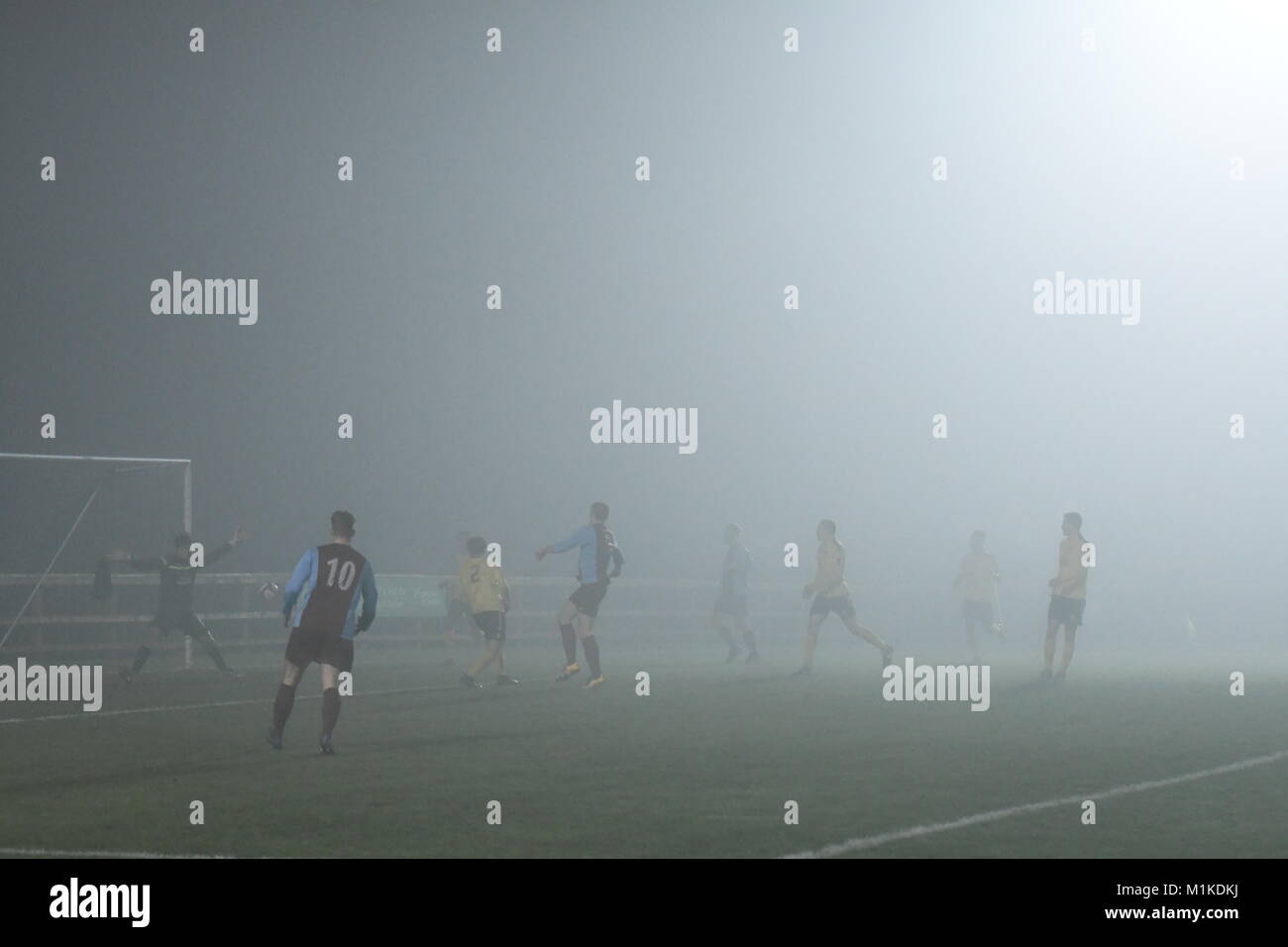Football in the fog Stock Photo Alamy