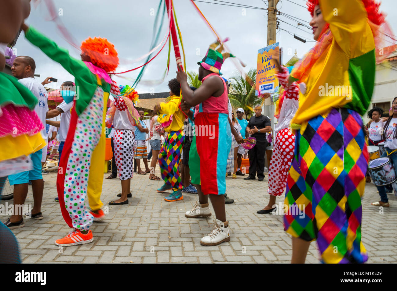 SALVADOR, BRAZIL -  CIRCA FEBRUARY, 2016: People in colorful costumes celebrate at annual Festival of Yemanja in the Rio Vermelho neighborhood Stock Photo