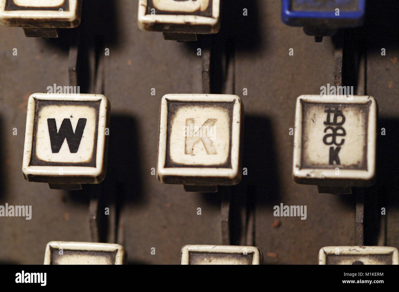 Linotype keyboard letters w, k keys at newspaper shop. Provost, Alberta, Canada. Stock Photo