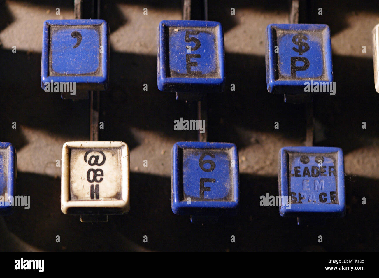 Linotype keyboard letters e, p, f keys closeup at newspaper shop. Provost, Alberta, Canada. Stock Photo