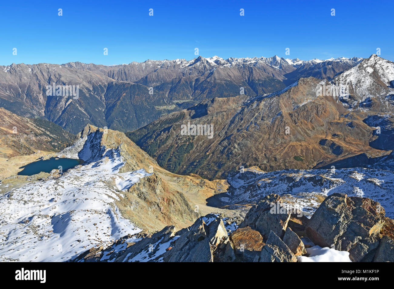 View from summit of Wildgrat (Oetztal Alps)  to the Stubai Alps at a sunny day in autumn. Tirol, Austria Stock Photo