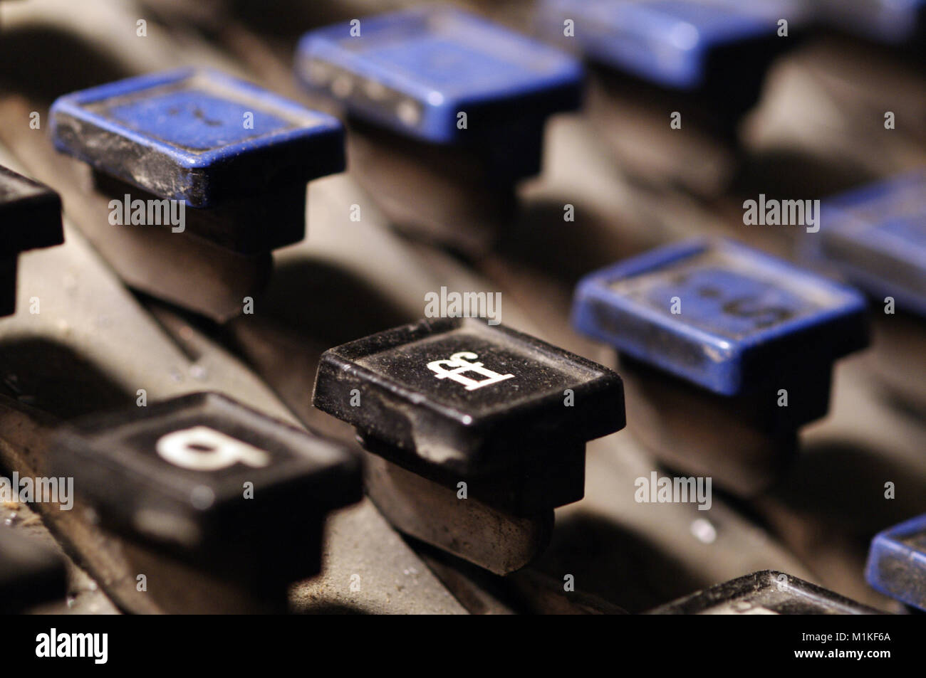 Linotype keyboard letters ff keys closeup at newspaper shop. Provost, Alberta, Canada. Stock Photo