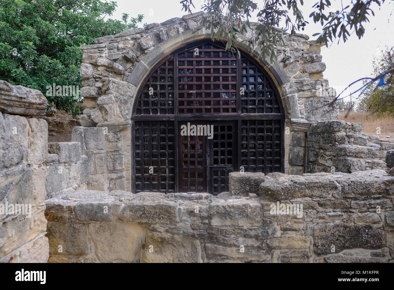 Front view of the ancient tiny chapel of  St. Stephen, near the village of Pachna in Cyprus. Stock Photo