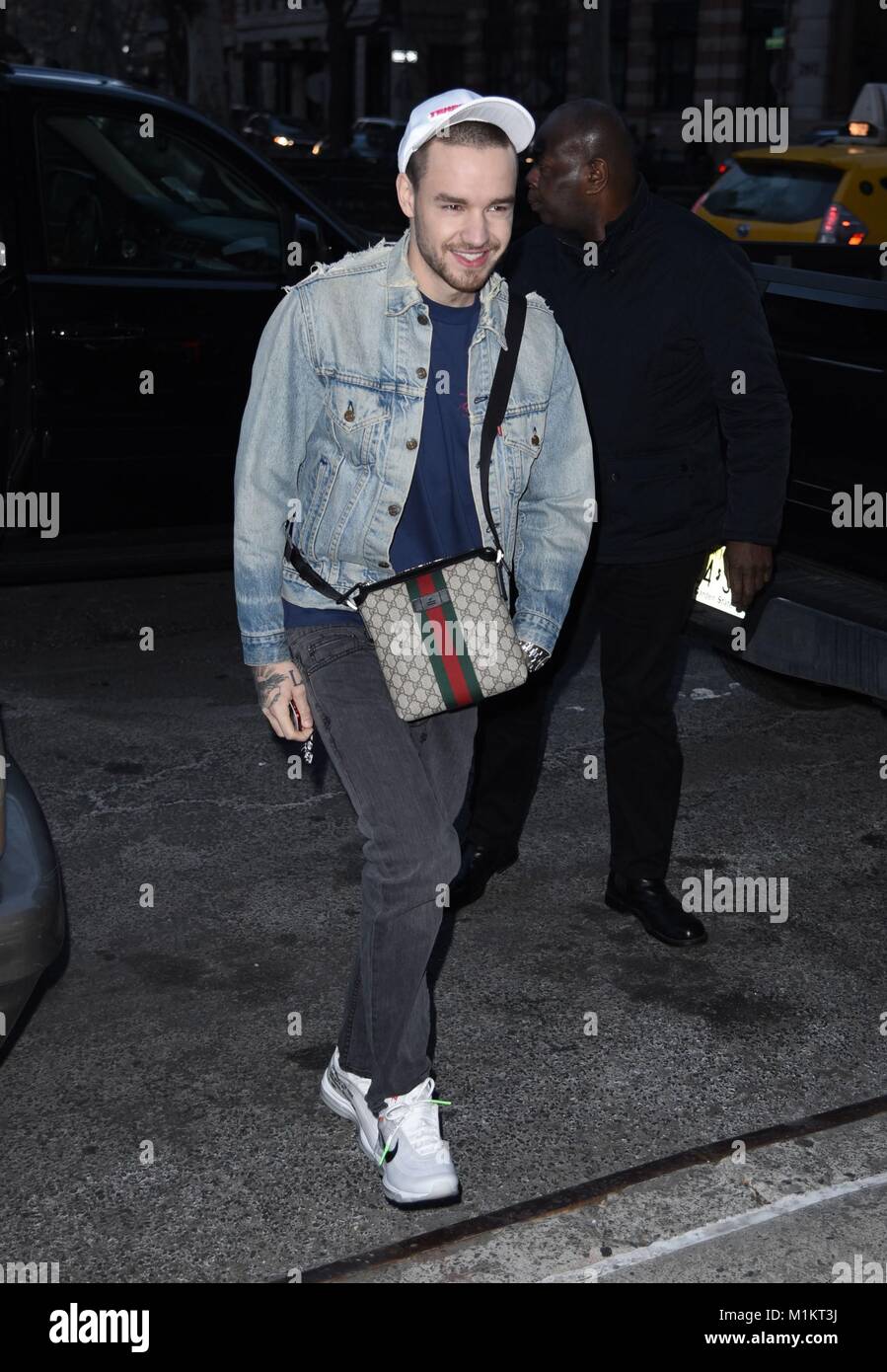 New York, NY, USA. 31st Jan, 2018. Liam Payne, seen at Z-100 studios for Elvis Duran and the Morning Show. He is wearing Off-White X Nike Air Max 97 sneakers. out and about for Celebrity Candids - WED, New York, NY January 31, 2018. Credit: Derek Storm/Everett Collection/Alamy Live News Stock Photo