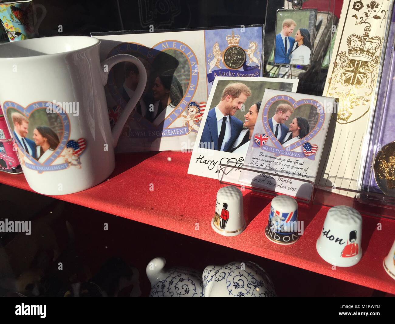 Souvenirs of the upcoming wedding of Prince Harry and Meghan Markle lie in a souvenir shop in Windsor, Germany, 17 January 2018. Photo: Christoph Meyer/dpa Stock Photo