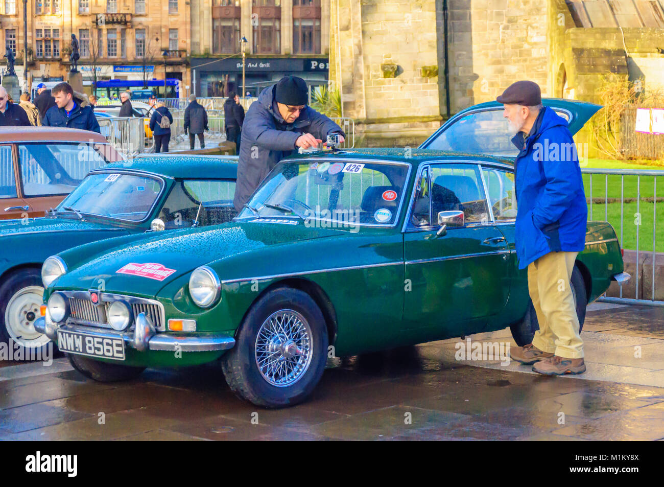 Paisley, Scotland, UK. 31st January 2018: A dark green MG. The Monte Carlo Rally starts at Paisley Abbey. This year sees the 21st  Historique event and the 3rd Classique event. Both events are staged by the Automobile Club de Monaco  and take place on open public roads. The distance to Monte Carlo is 1270 miles. Credit: Skully/Alamy Live News Stock Photo