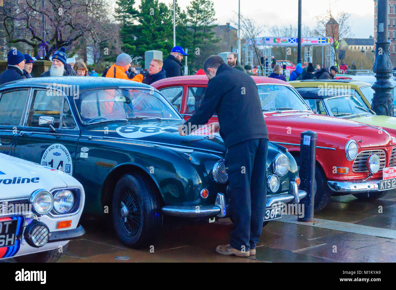 Paisley, Scotland, UK. 31st January 2018: Sticker placed on dark green Jaguar car. The Monte Carlo Rally starts at Paisley Abbey. This year sees the 21st  Historique event and the 3rd Classique event. Both events are staged by the Automobile Club de Monaco  and take place on open public roads. The distance to Monte Carlo is 1270 miles. Credit: Skully/Alamy Live News Stock Photo