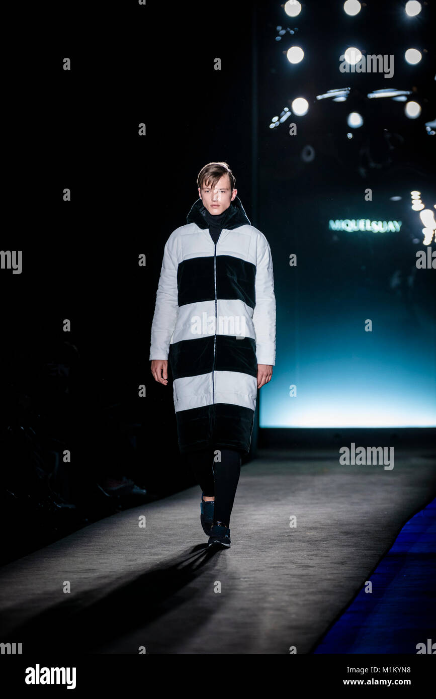 Barcelona, Spain. 31st Jan, 2018. A model walks the runway at the Miquel Suay fashion show presenting the new 'Autumn/Winter 18/19' collection during 080 Barcelona Fashion Week Credit: Matthias Oesterle/Alamy Live News Stock Photo