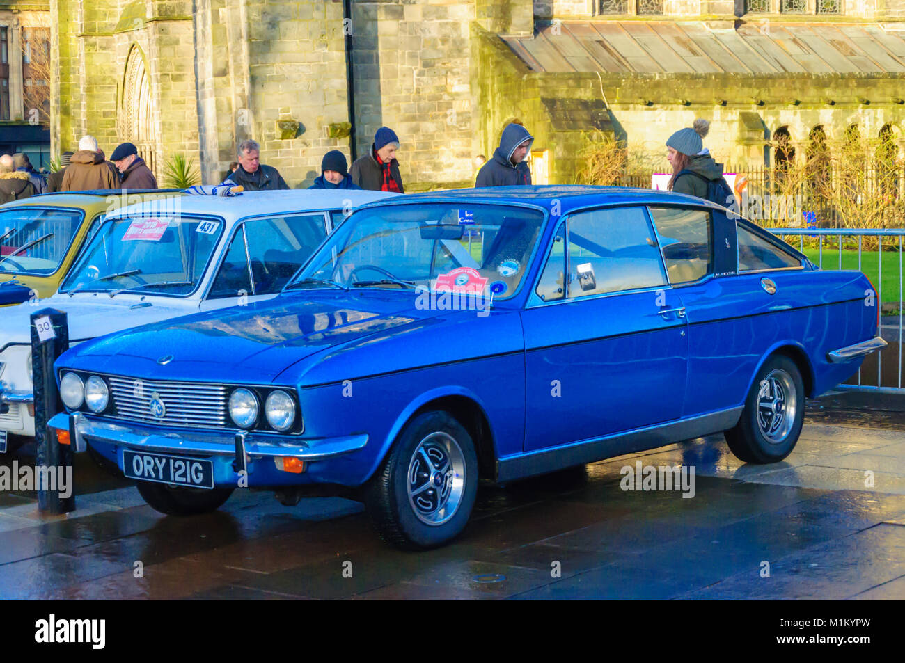 Paisley, Scotland, UK. 31st January 2018: The side view of a blue Sunbeam Rapier car. The Monte Carlo Rally starts at Paisley Abbey. This year sees the 21st  Historique event and the 3rd Classique event. Both events are staged by the Automobile Club de Monaco  and take place on open public roads. The distance to Monte Carlo is 1270 miles. Credit: Skully/Alamy Live News Stock Photo