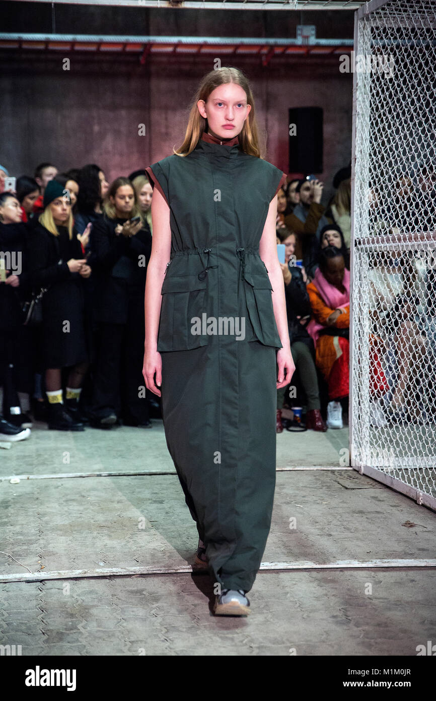 Copenhagen, Denmark 31 January, 2018. A model walks the runway at the HAN Kjøbenhavn show presenting thre new Autumn/Winter 18 collection during Copenhagen Fashion Week A/W18  The show took place in a warehouse designed as a mental hospital inside a cage of wire fence. Credit: OJPHOTOS/Alamy Live News Stock Photo