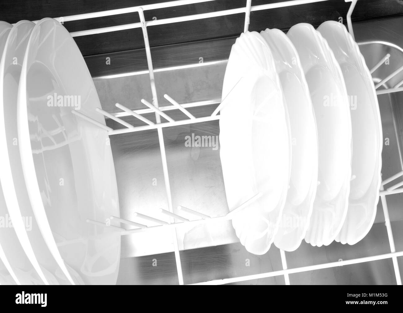 clean white dishes in the dishwasher, top view Stock Photo Alamy