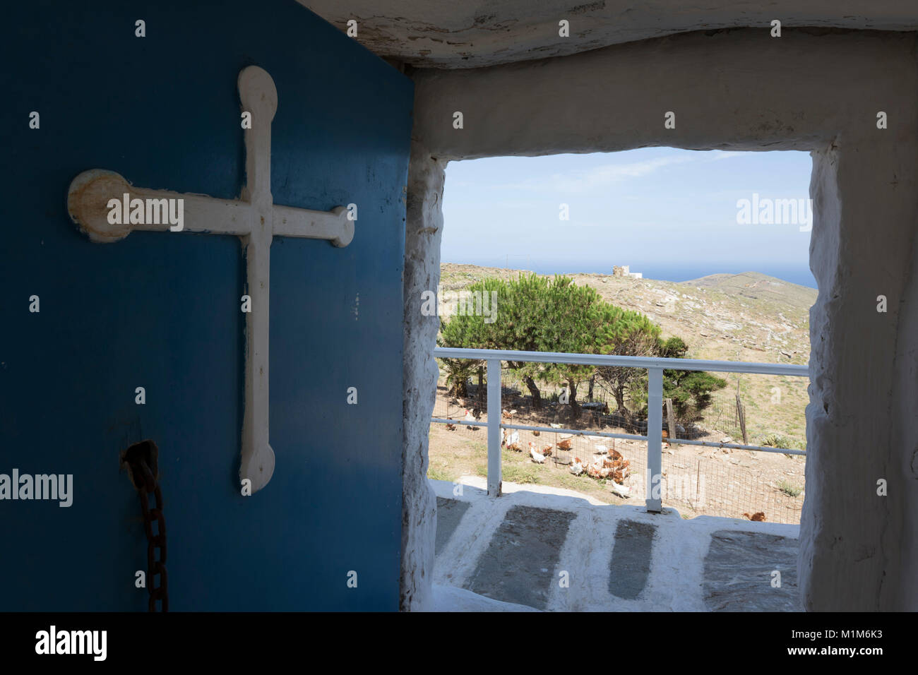 View through door of Moni Taxiarchon Monastery in north east of island, Serifos, Cyclades, Aegean Sea, Greek Islands, Greece, Europe Stock Photo