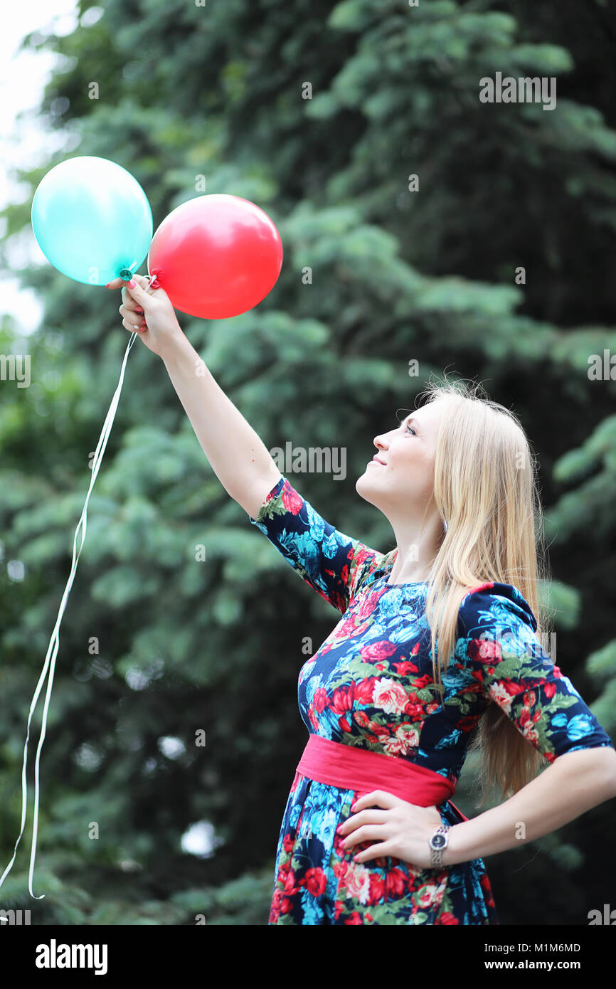 Girl in the street with an umbrella Stock Photo - Alamy