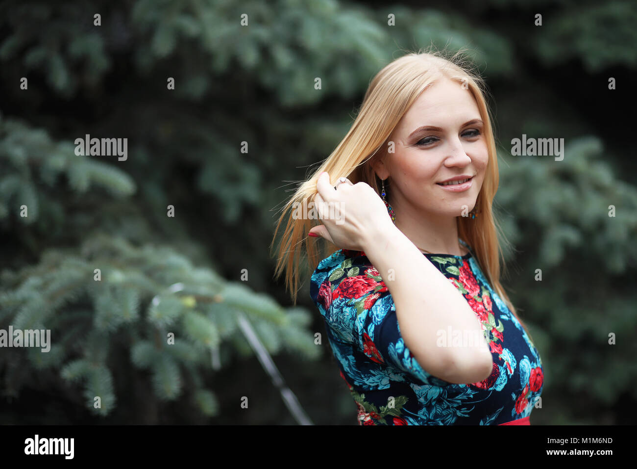 Girl in the street with an umbrella Stock Photo - Alamy