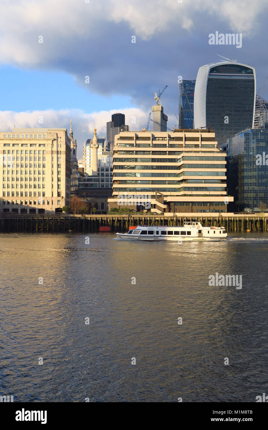 City of London skyline showing the Old Billingsgate fish market, St Magnus the Martyr Church taken from Queen's walk, South Bank Stock Photo