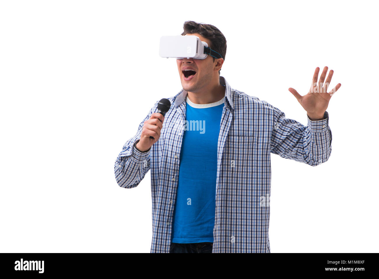 Young man wearing virtual reality VR glasses Stock Photo - Alamy