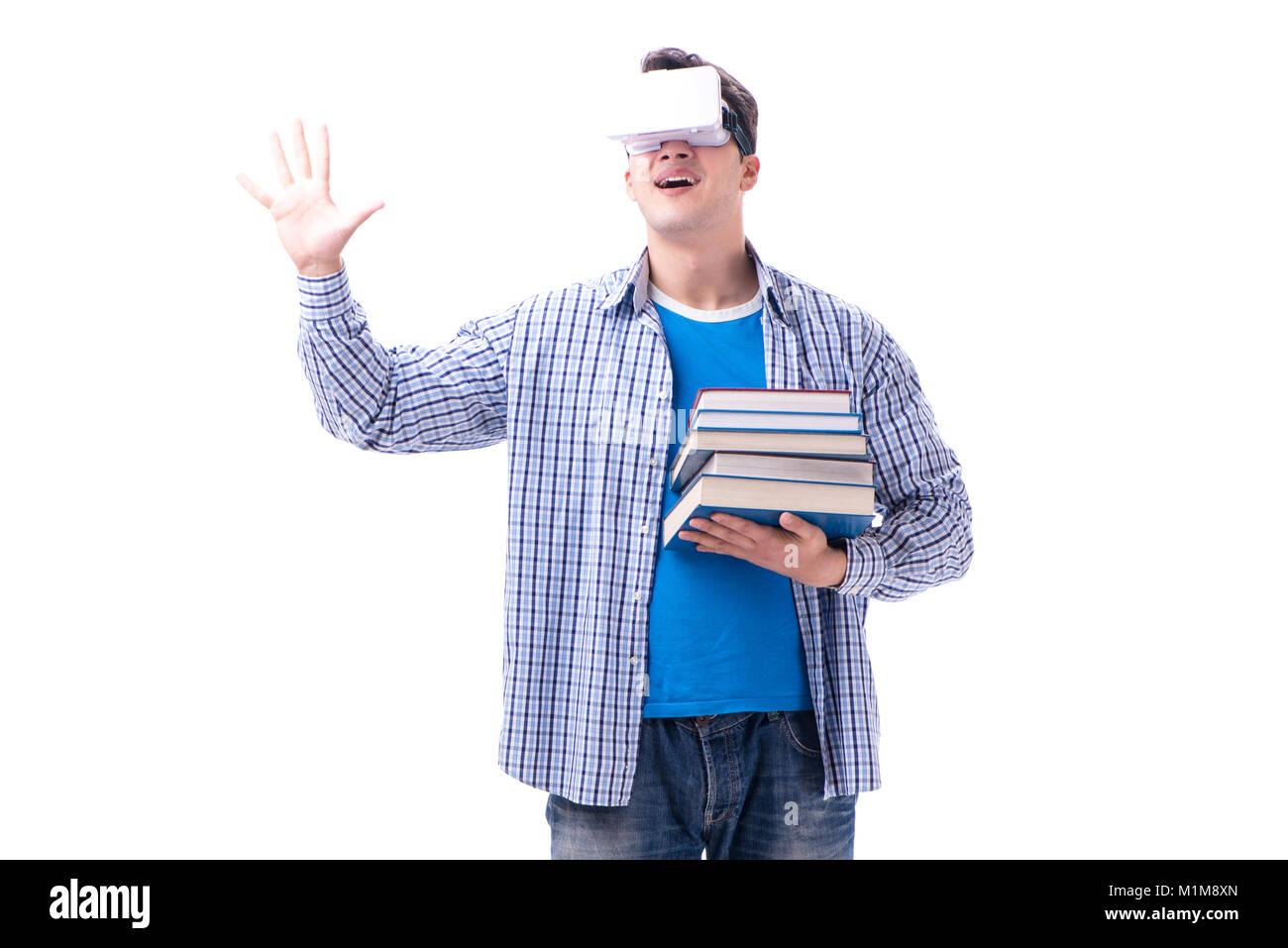 Young man wearing virtual reality VR glasses Stock Photo - Alamy
