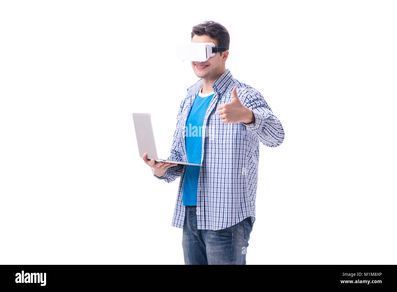 Young man wearing virtual reality VR glasses Stock Photo - Alamy