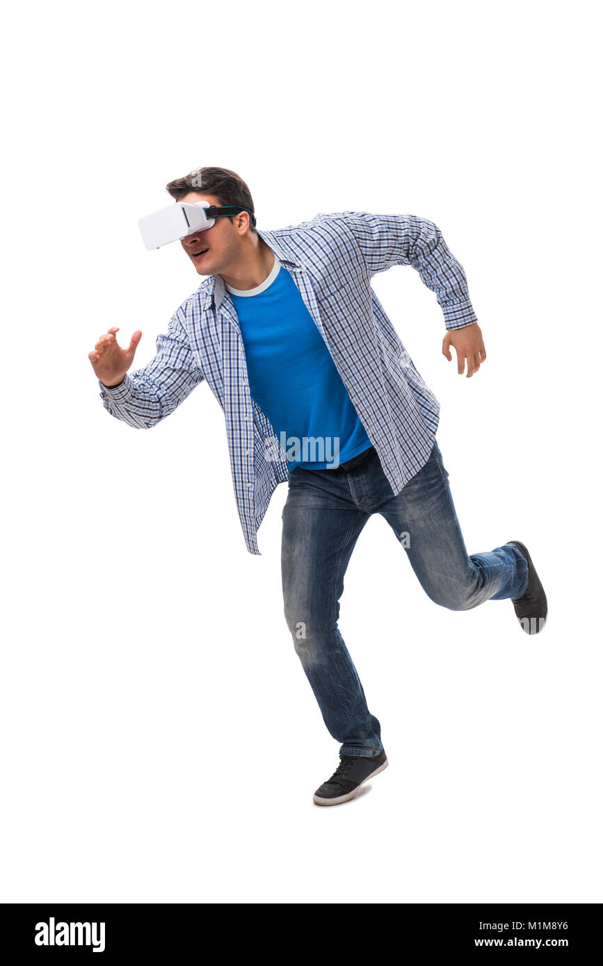 Young man wearing virtual reality VR glasses Stock Photo - Alamy