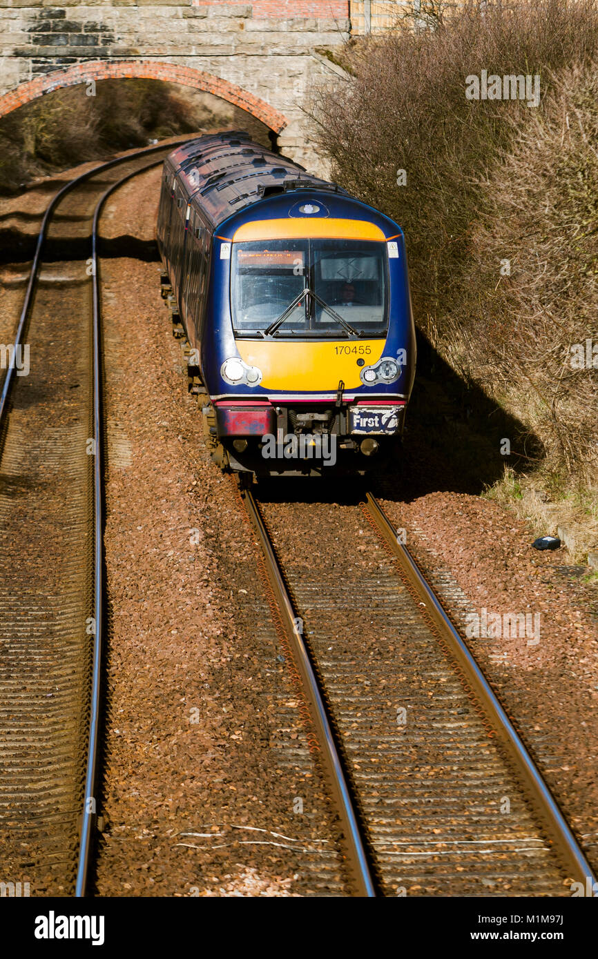 East coast commuter diesel train, north of Montrose. Angus Scotland Stock Photo