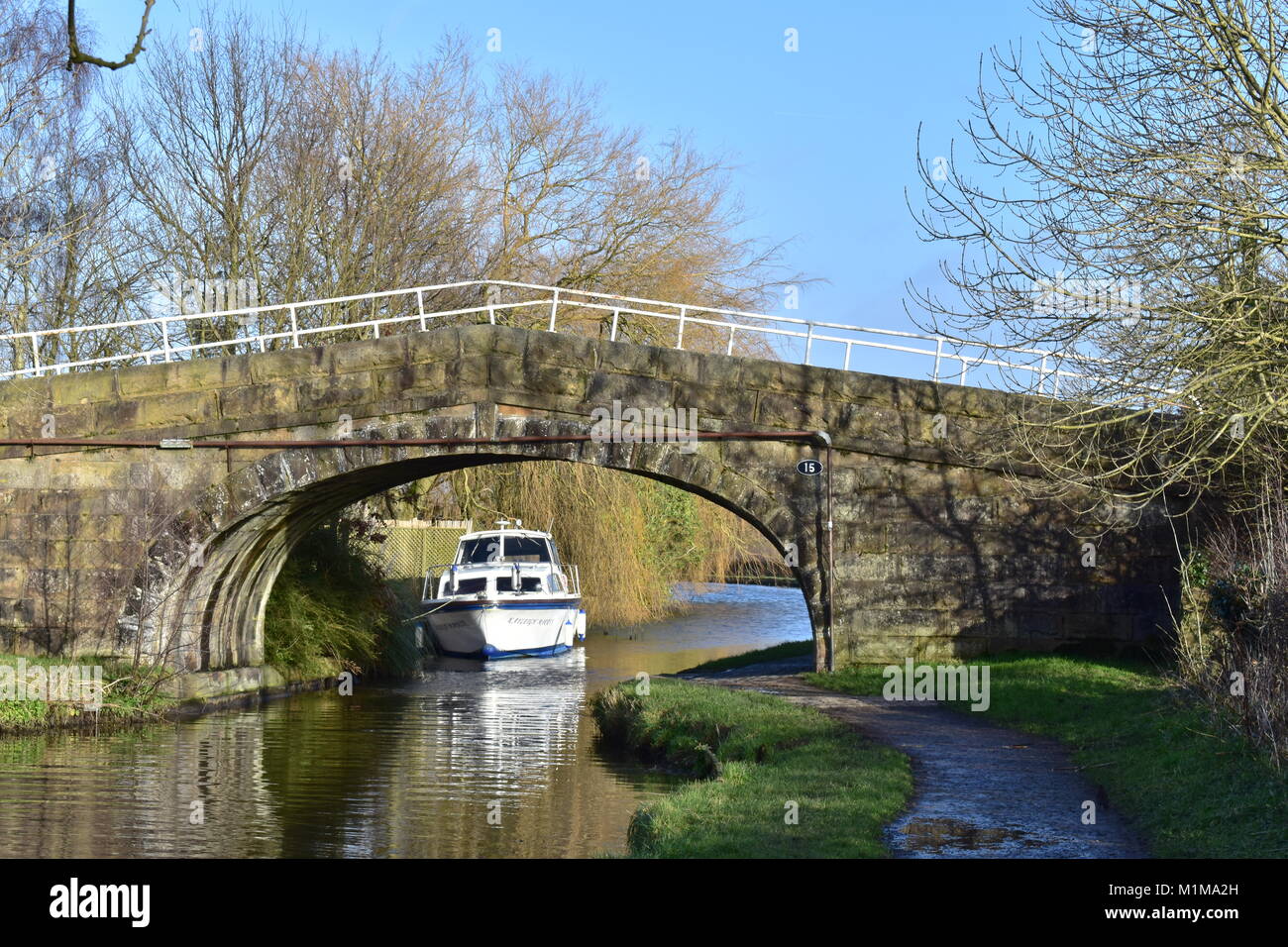 canal bridge with boat Stock Photo