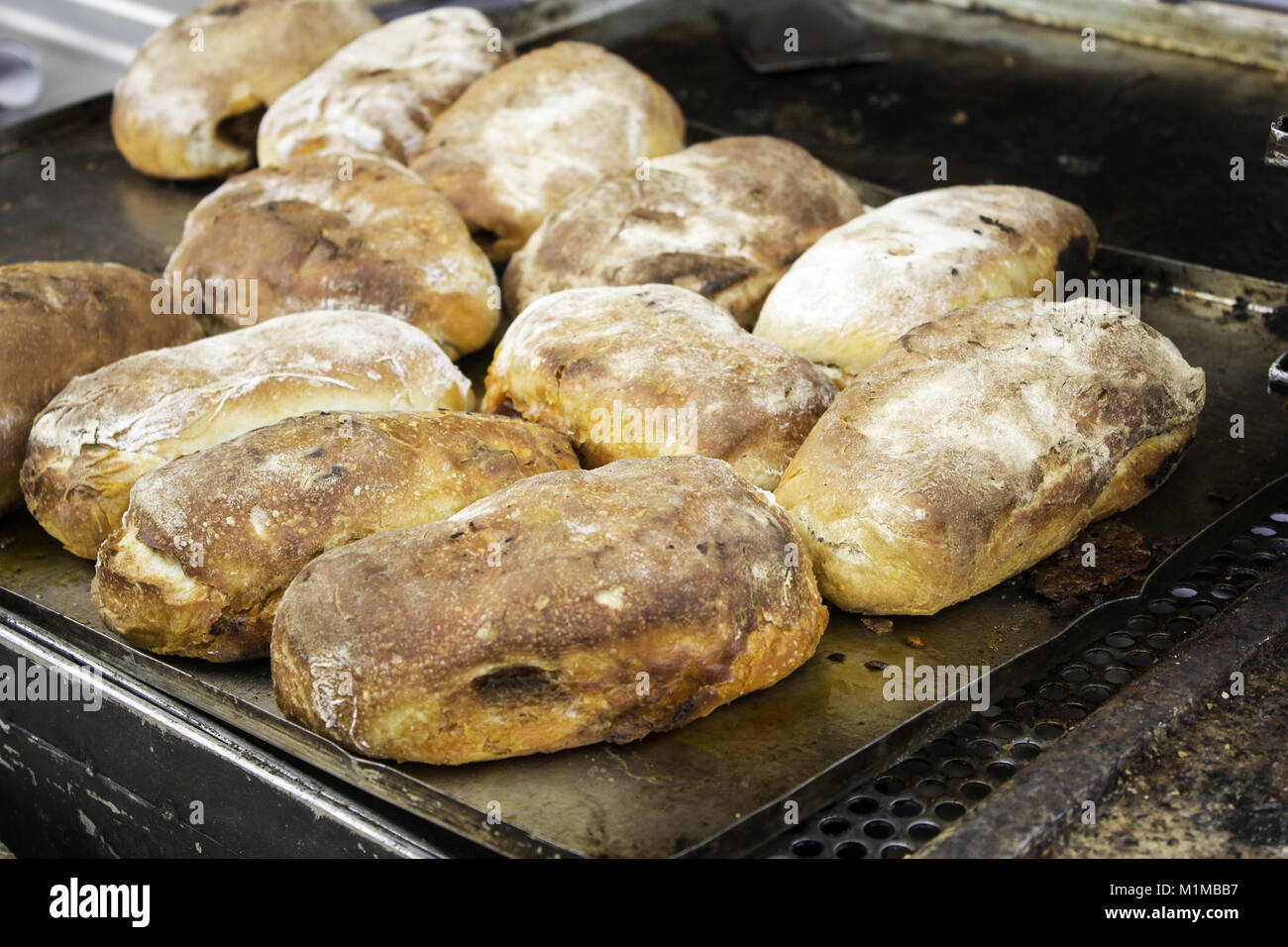 Stuffed sausage sandwich in restaurant, fast and insane food Stock Photo