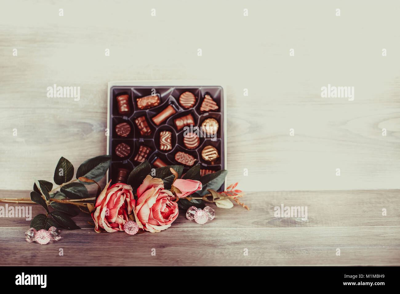 Box Of Chocolates And Roses On Wooden Table Valentines Day Stock