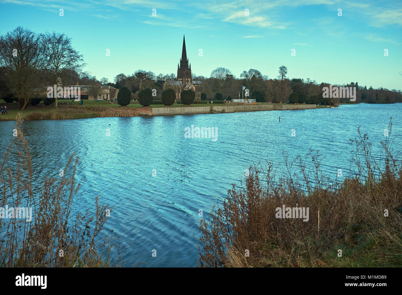 Sunny December view View of National Trust Property of Clumber park across Clumber Lake. Nottinghamshire Stock Photo