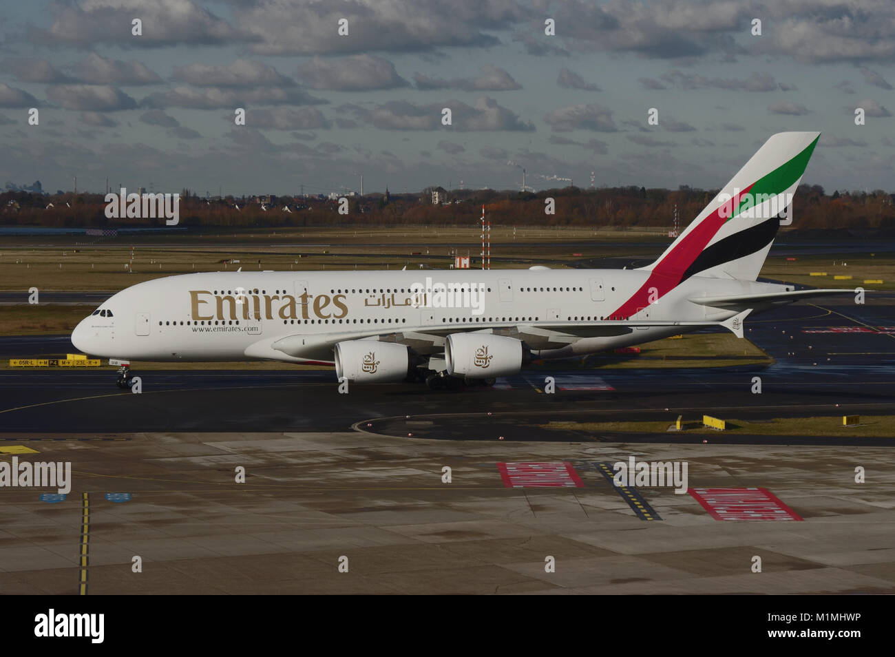 Duesseldorf, Germany - January 05, 2017: Airbus A380-800 of Emirates Airline taxiing at the airport of Duesseldorf Stock Photo