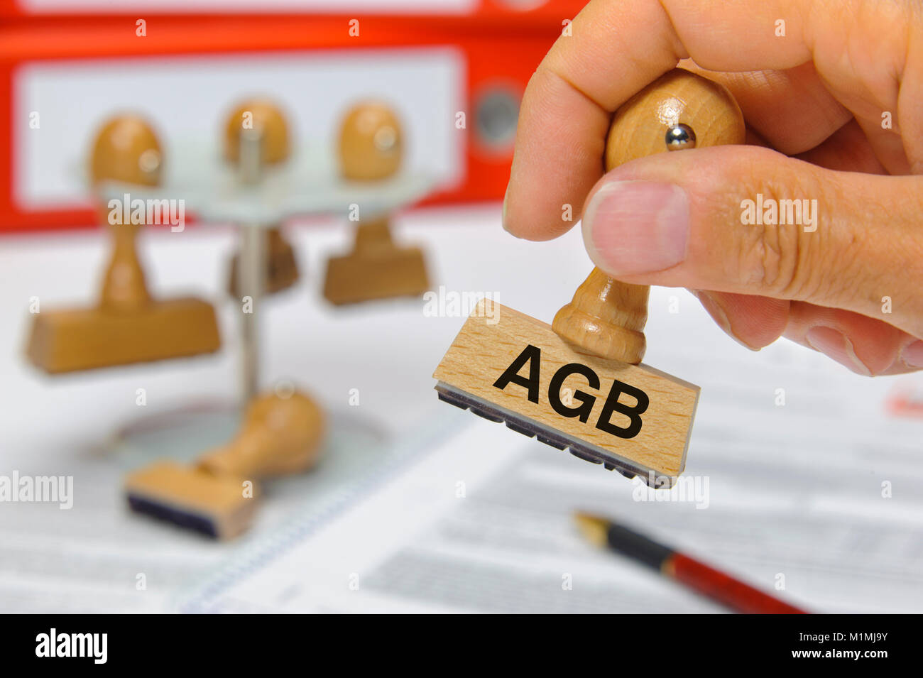 Stempel in Hand beschriftet mit AGB Stock Photo