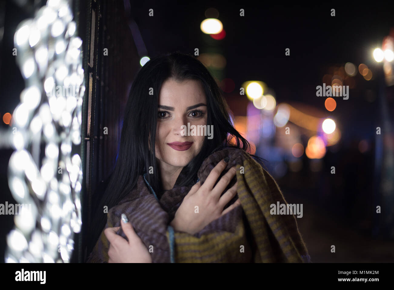 Woman standing in street hi-res stock photography and images - Alamy