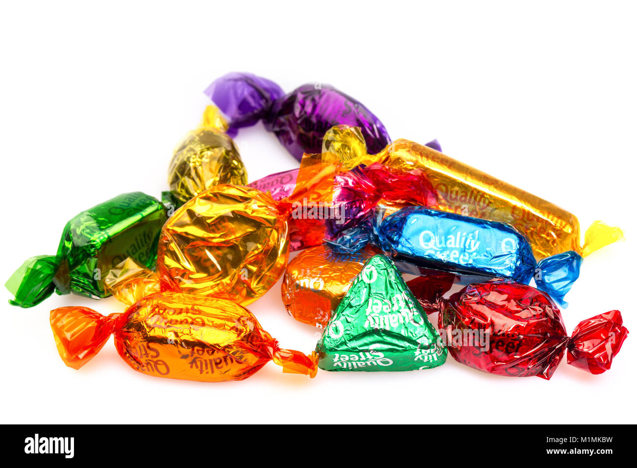 Quality Street chocolates on a white background Stock Photo