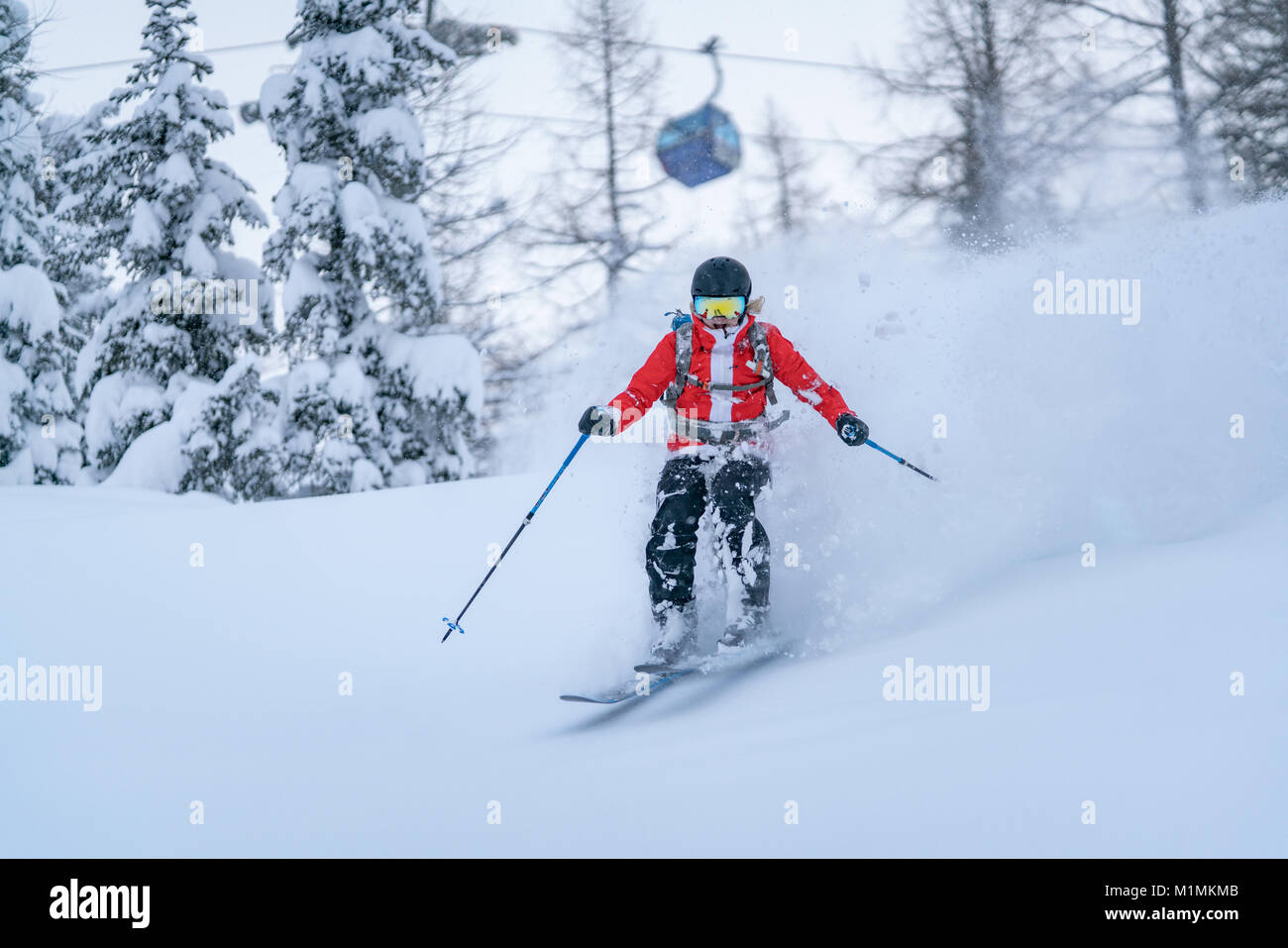 Woman Powder Skiing in the Alps,Sportgastein,Salzburg,Austria Stock Photo