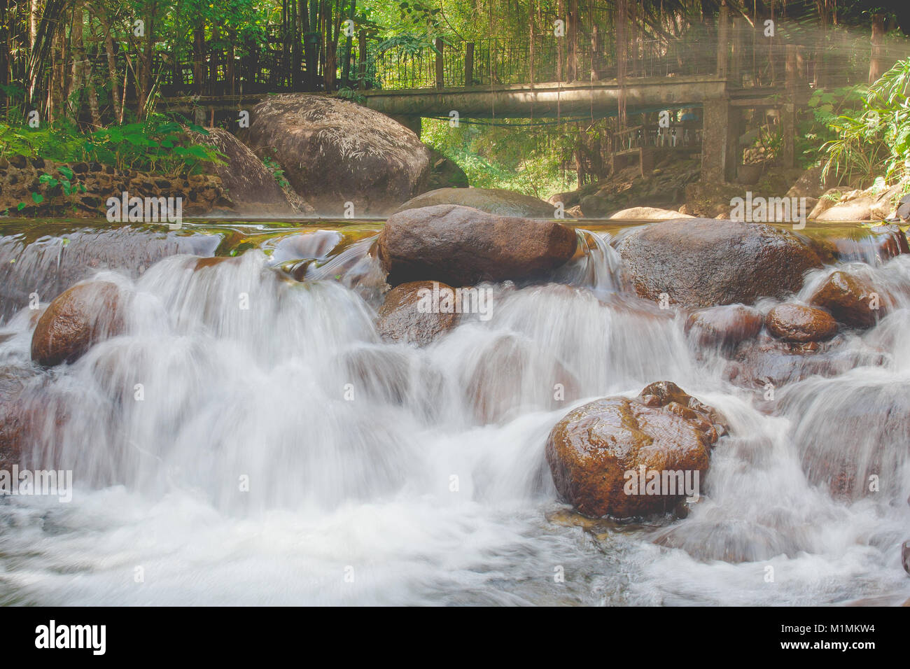 Beautiful landscape view of small waterfall in the river with water ...