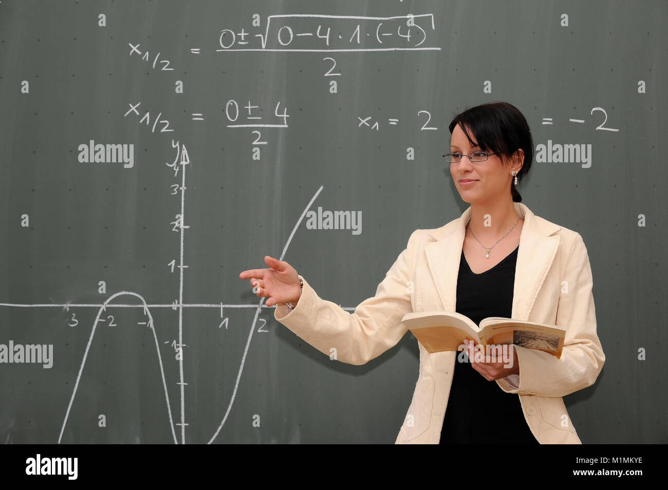 School Teacher gives lessons MR, Schule - Lehrerin gibt Unterricht MR Stock Photo