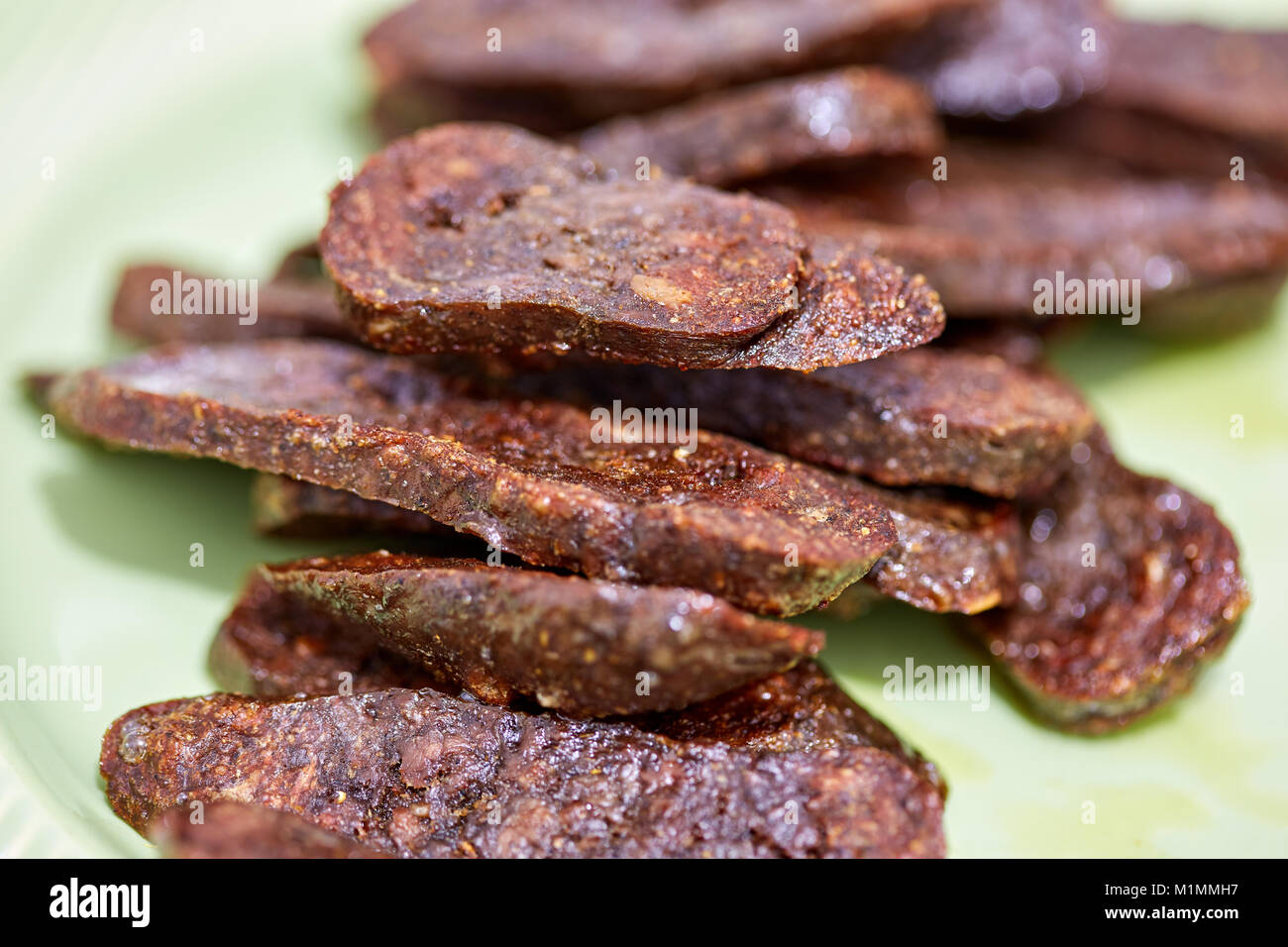 Turkish göden sausage sliced and grilled in closeup Stock Photo