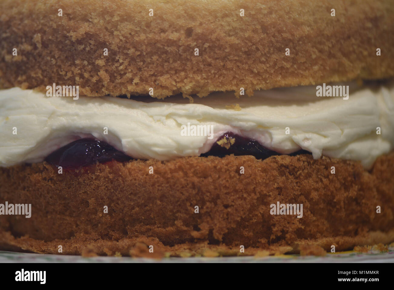 food image of close up home made traditional Victoria sponge cake with