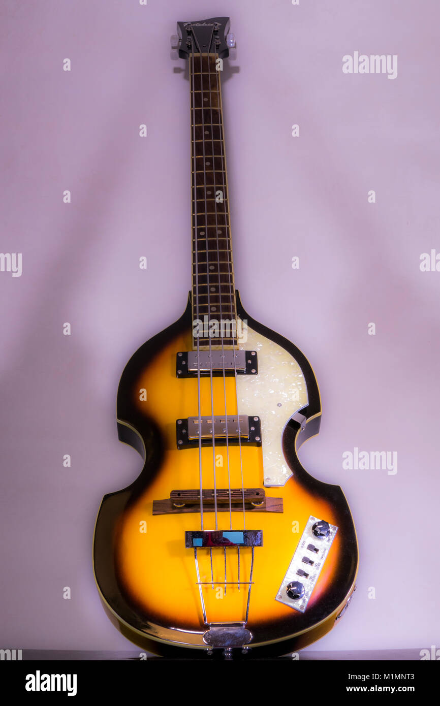 Beatles / Beatle violin bass guitar. Original models of this iconic shape instrument were introduced in the 1950s, with replicas like this still made. Stock Photo