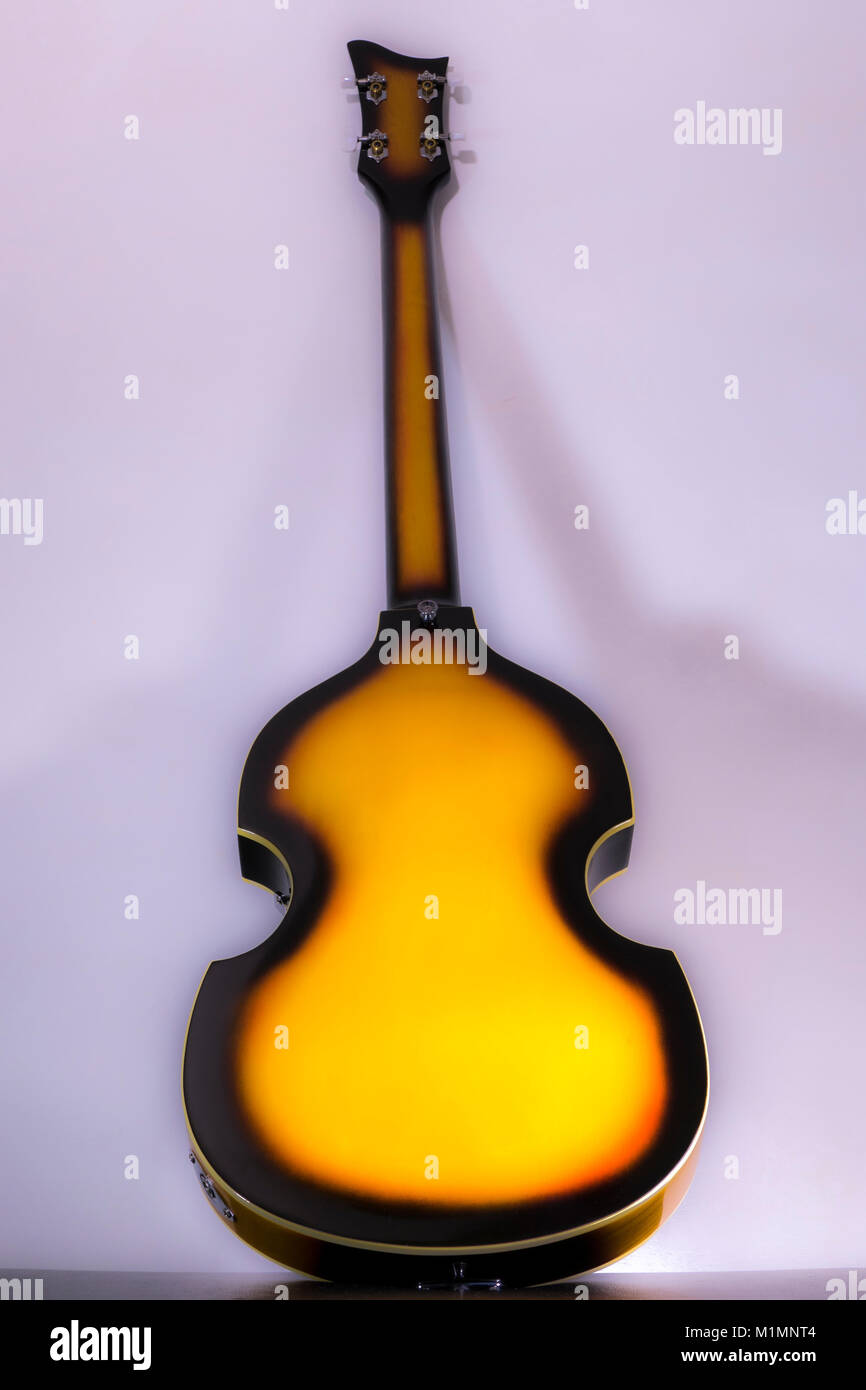 Beatles / Beatle violin bass guitar. Original models of this iconic shape instrument were introduced in the 1950s, with replicas like this still made. Stock Photo