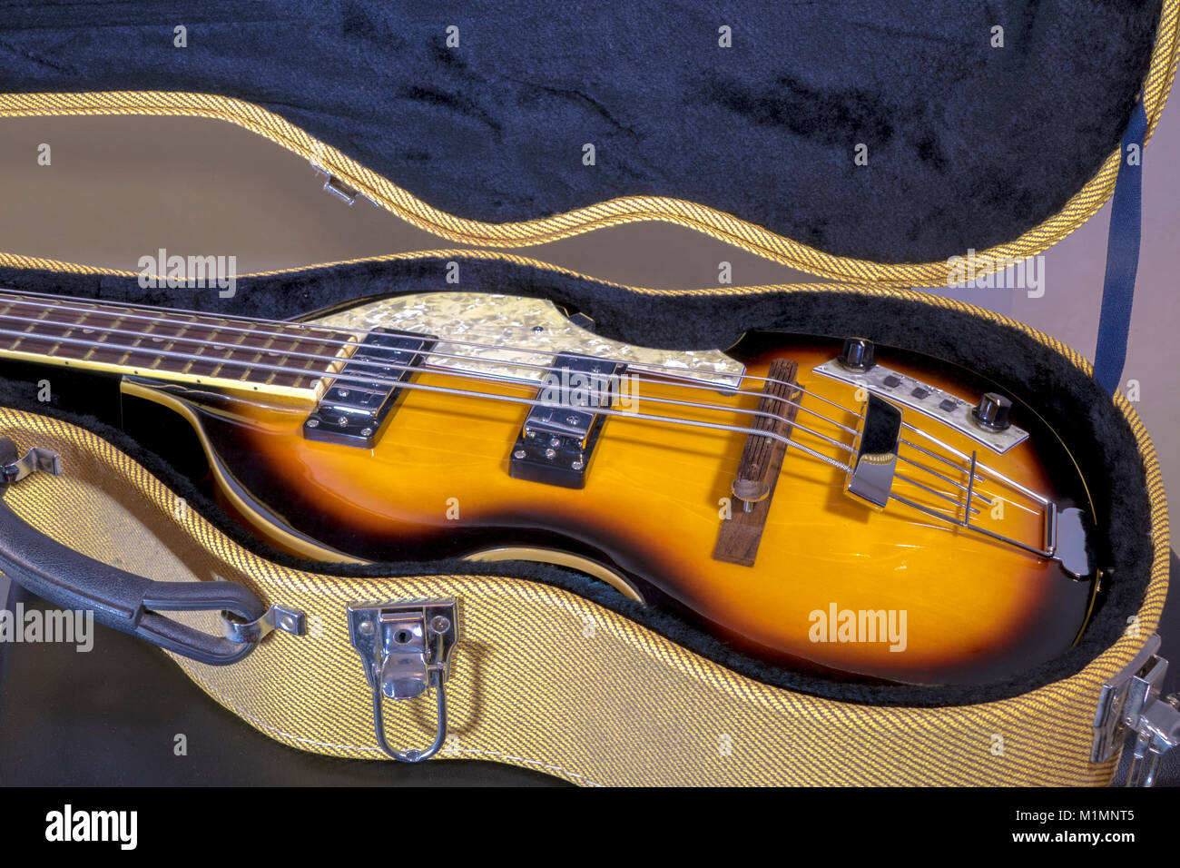Beatles / Beatle violin bass guitar. Original models of this iconic shape instrument were introduced in the 1950s, with replicas like this still made. Stock Photo