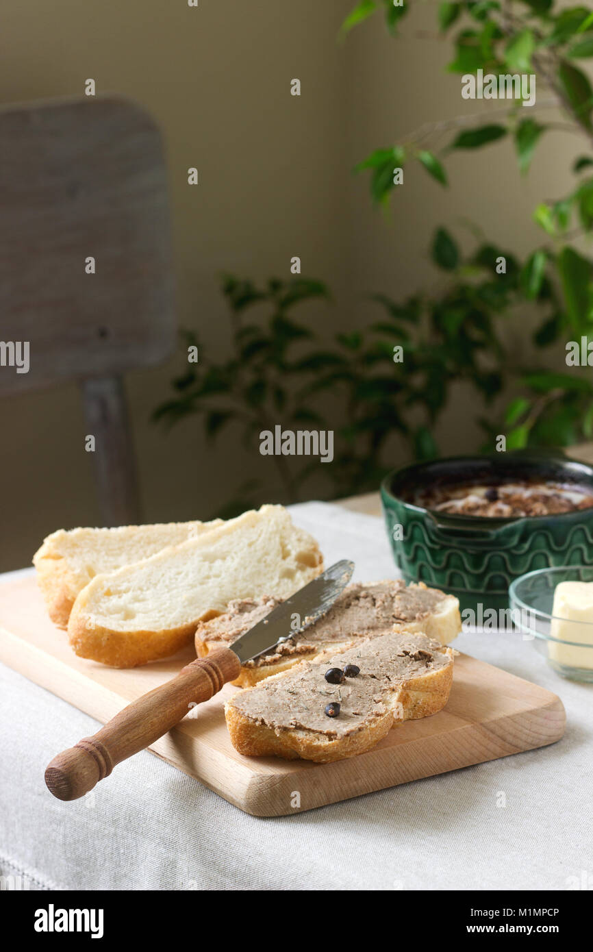 Homemade liver pate with bread and butter. Rustic style Stock Photo - Alamy